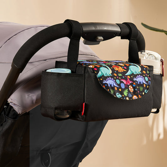 PACKD stroller organizer with insulated cup holders and dinosaur print flap